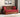 Della Sheesham Wood Sofa Cum Bed With Armrests (Honey Berry Diamonds)